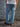 Jean de Demons & Machines de calce oversize. De tiro medio, este fit cae relajado con una apertura de pierna amplia y recta que continua regular hacia la botamanga. Lavado stone con sobre teñido crudo logrando un tono celeste vintage, gastados localizados y roturas reparadas a mano para un auténtica apariencia vintage.