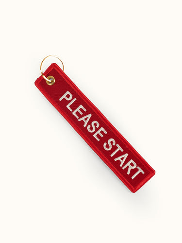 Please Start Keychain in Red, back view — the second embroidered face. #color_red