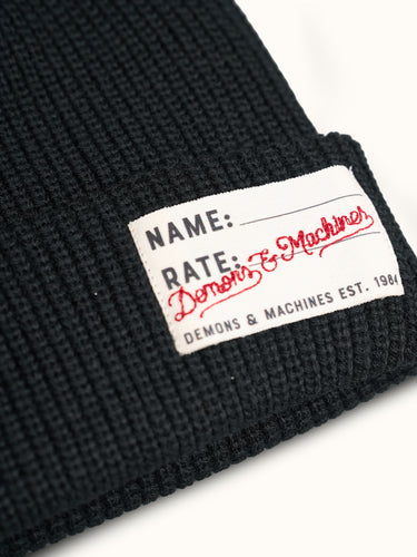 Gorro tejido negro de la marca Demons & Machines, gorro estilo beanie con textura suave y cómodo. #color_negro