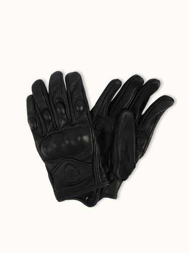 Guantes DEMONS & MACHINES Redwood de cuero negro con detalles resistentes y diseño ergonómico para protección y estilo.