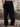 Pantalón DEMONS & MACHINES de calce relaxed con impronta sastrera, ideal para lucir un look casual y descontracturado. #color_negro