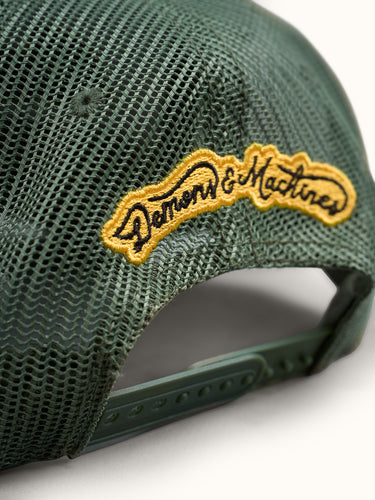 Gorra verde de la marca Demons & Machines con diseño estilo Saint Louis, vista frontal en la imagen. #color_verde