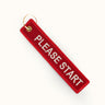 Please Start Keychain in Red, back view — the second embroidered face. #color_red