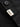 Camisa Garage Boulder negra, detalle de la etiqueta D&M en la cartera. #color_negro
