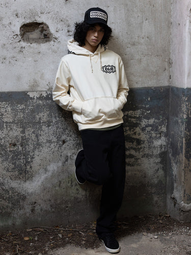 Chain Hoodie in Ivory, construction detail — the reverse terry triangle insert at the neckline. #color_ivory