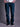 Jean de Demons & Machines de calce boot-cut confeccionado en denim elastizado. De tiro medio-alto, con entalle regular en cintura y cadera, y pierna que se va despegando terminando en una botamanga ligeramente abierta, ideal no solo para las botas sino para acompañar todo tipo de calzado.