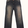 Jean Alex Vintage Blue de calce oversize, vista frontal sobre fondo crudo: lavado vintage terroso y roturas reparadas. #color_azul