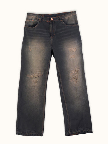Jean Alex Vintage Blue de calce oversize, vista frontal sobre fondo crudo: lavado vintage terroso y roturas reparadas. #color_azul