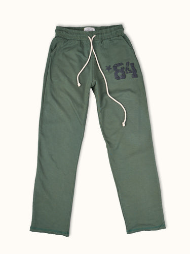 Pantalones jogger deportivos verdes de entrenamiento Demons & Machines, vista frontal en estilo casual y cómodo. #color_verde