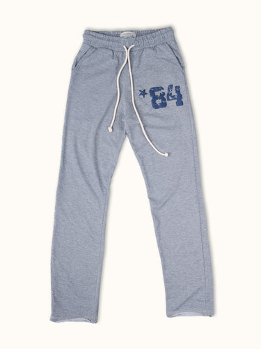 Pantalones jogger de entrenamiento gris de la marca Demons & Machines, vista frontal en la imagen. #color_gris