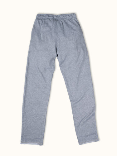 Pantalones jogger de entrenamiento gris de la marca Demons & Machines, vista frontal con detalles de tela y ajuste cómodo.  #color_gris