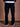 Pantalón cargo Benson negro de la marca Demons & Machines, vista frontal con bolsillos laterales y diseño robusto. #color_negro