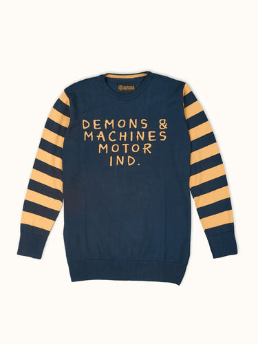 Suéter Maine de Demons & Machines, cuello redondo tejido en hilado de algodón. Arte frontal en jacqard y mangas rayadas. Regular fit. #color_azul