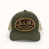 Gorra vintage verde de la marca Demons & Machines, vista desde el ángulo con detalles en la tela y diseño clásico. #color_verde